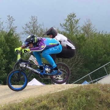 Julie van den Ham en Sam Meijer van het Talent BMX Team winnaars van nationale fietscross wedstrijd in Erp.              